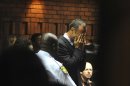 Athlete Oscar Pistorius weeps in court in Pretoria, South Africa, Friday, Feb 15, 2013, at his bail hearing in the murder case of his girlfriend Reeva Steenkamp. Oscar Pistorius arrived at a courthouse Friday, for his bail hearing in the murder case of his girlfriend as South Africans braced themselves for the latest development in a story that has stunned the country. The Paralympic superstar was earlier seen leaving a police station in a dark suit with a charcoal gray jacket covering his head as he got into a police vehicle. Model Reeva Steenkamp was shot and killed at Pistorius' upmarket home in an eastern suburb of the South African capital in the predawn hours of Thursday. (AP Photo/Antione de Ras - Independent Newspapers Ltd South Africa) SOUTH AFRICA OUT