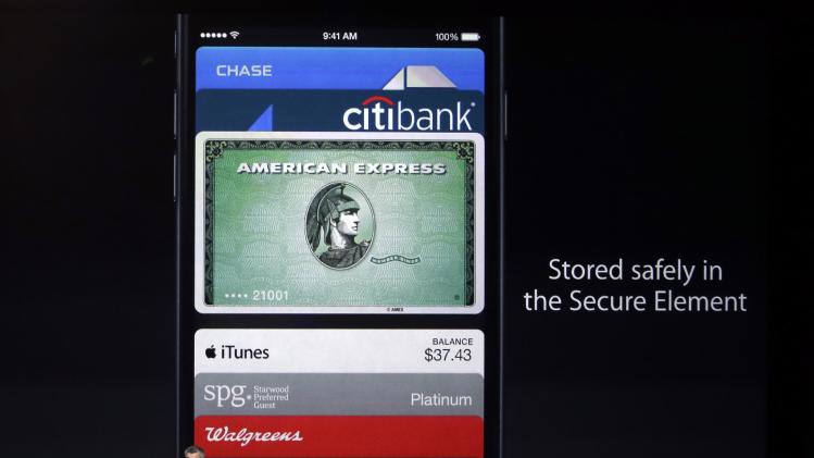 Eddy Cue, Apple Senior Vice President of Internet Software and Services, discusses the new Apple Pay product on Tuesday, Sept. 9, 2014, in Cupertino, Calif. (AP Photo/Marcio Jose Sanchez)