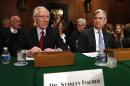 Stanley Fischer, the former chief of the Bank of Israel, prepares to testify before the Senate Banking Committee confirmation hearing in Washington