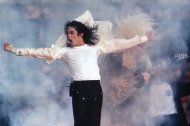 FILE - This Feb. 1, 1993 file photo shows Pop superstar Michael Jackson performing during the halftime show at the Super Bowl in Pasadena, Calif. Jackson's words and music rang through a courtroom once again on Monday, April 29, 2013, this time at the start of wrongful death trial, as a lawyer tried to show jurors the pop singer's loving relationship with his mother and children. (AP Photo/Rusty Kennedy, file)