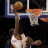New York Knicks forward Amare Stoudemire (1) tips the ball in over the defense of San Antonio Spurs forward Tiago Splitter (22) in the first half of their NBA basketball game at Madison Square Garden in New York, Thursday, Jan. 3, 2013. (AP Photo/Kathy Willens)