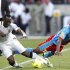 Ghana's Jerry Agyeman Badu collides with Cedric Makiadi of the Democratic Republic of Congo during their African Nations Cup Group B soccer match at the Nelson Mandela Bay Stadium in Port Elizabeth