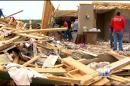 Arkansas Tornado Victims Busy Clearing Debris
