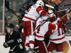 Detroit Red Wings players celebrate Gustav Nyquist's goal during overtime as Anaheim Ducks' Corey Perry (10) skates off in Game 2 of their first-round NHL hockey Stanley Cup playoff series in Anaheim, Calif., Thursday, May 2, 2013. The Red Wings won 5-4. (AP Photo/Chris Carlson)