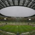In this photo taken with a fisheye lens, a general view of the Gdansk stadium during a training session by the Greek national soccer team prior to the Euro 2012 soccer quarterfinal match between Germany and Greece in Gdansk, Poland, Thursday, June 21, 2012. (AP Photo/Frank Augstein)