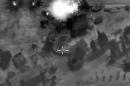 A video grab made on October 1, 2015, shows an image taken footage made available on the Russian Defence Ministry's official website, purporting to show an airstrike in Syria