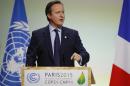 British Prime Minister David Cameron addresses world leaders at the COP21, United Nations Climate Change Conference, in Le Bourget, outside Paris, Monday, Nov. 30, 2015. (AP Photo/Michel Euler)