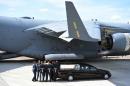 The coffin of Bruce Wilkinson is placed in a hearse at RAF Brize Norton in Oxfordshire, England, on July 4, 2015, one of the thirty British nationals killed in last week's Tunisia terrorist attack
