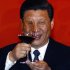 File photo of Chinese Vice-President Xi holding a glass of red wine as he toasts at a dinner to mark the 40th anniversary of U.S. President Nixon's visit to China, in Beijing