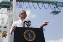 Obama gestures as he delivers remarks on infrastructure investment at PortMiami in Miami, Florida