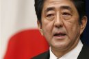 Japan's new Prime Minister Shinzo Abe attends a news conference at his official residence in Tokyo