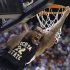 Wichita State's Carl Hall (22) dunks the ball in the first half during a third-round game against Gonzaga in the NCAA men's college basketball tournament in Salt Lake City Saturday, March 23, 2013. (AP Photo/Rick Bowmer)