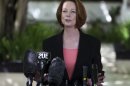 FILE - In this Nov. 9, 2012 photo, Australian Prime Minister Julia Gillard talks to media in Bali, Indonesia. Leaders of two of the closest longtime allies of the United States have been quick to express sympathy over a shooting rampage that left 26 people dead, including 20 children, at a Connecticut elementary school. Gillard said in a statement Saturday that her country shares America's shock at what she called "this senseless and incomprehensible act of evil." (AP Photo/Firdia Lisnawati, File)
