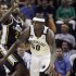 Memphis Grizzlies' Zach Randolph (50) drives around Utah Jazz's Marvin Williams (2) during the second half of an NBA basketball game in Memphis, Tenn., Wednesday, April 17, 2013. Randolph scored 25 points during the Grizzlies 86-70 victory over the Jazz. (AP Photo/Danny Johnston)