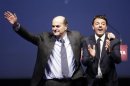 Italian PD (Democratic Party) leader Bersani waves next to mayor of Florence Renzi during a political rally in Florence