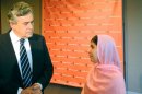 Pakistani student Malala Yousafzai speaks with Gordon Brown at a World School Day event , September 23, 2013 in New York