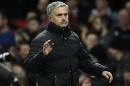 Manchester United's manager Jose Mourinho leaves the pitch following the EFL Cup semi-final football match against Hull City January 10, 2017