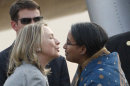 U.S. Secretary of State Hillary Rodham Clinton, left, is greeted by Bangladeshi Foreign Minister Dipu Moni upon her arrival in Dhaka, Bangladesh, Saturday, May 5, 2012. Clinton is in Bangladesh to press tolerance, democracy and development in one of the world's most impoverished nations that is now in the throes political turmoil. (AP Photo/Pavel Rahman)