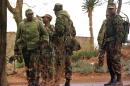 File photo shows members of the Lesotho military on patrol in the capital Maseru, on September 17, 1999