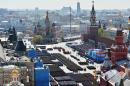 FILE - In this May 9, 2015, file photo, the Victory Parade marking the 70th anniversary of the defeat of the Nazis in World War II is held in Red Square, with the Kremlin, right, and St. Basil Cathedral, back, in Moscow, Russia. Fox intends to build a studio in Moscow's Red Square to base its coverage of the 2018 World Cup. (Host photo agency/RIA Novosti Pool Photo via AP)