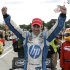 Simon Pagenaud, of France, celebrates his victory in the IndyCar Detroit Grand Prix auto race on Belle Isle in Detroit, Sunday, June 2, 2013. (AP Photo/Paul Sancya)