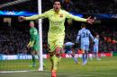 Barcelona's Luis Suarez celebrates after scoring his second goal against Manchester City during the Champions League round 16 match between Manchester City and Barcelona at the Etihad Stadium, in Manchester, England, Tuesday, Feb. 24, 2015. (AP Photo/Rui Vieira)