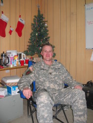 This Dec. 15, 2006 photo provided by Brock McNabb shows Pete Linnerooth in their Christmas-decorated office in Baghdad, Iraq. Capt. Linnerooth, an Army psychologist, counseled soldiers during some of the fiercest fighting in Iraq. (AP Photo/Brock McNabb)