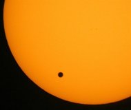 FILE - This June 8, 2004 file photo shows the transit of Venus, which occurs when the planet Venus passes between the Earth and the Sun, is pictured in Hong Kong. Venus will cross the face of the sun on Tuesday June 5, 2012, a sight that will be visible from parts of Earth. This is the last transit for more than 100 years. (AP Photo/Vincent Yu,File)