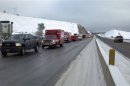 Rescue personnel respond to the scene of a charter bus crash on I-84, east of Pendleton, Oregon in this handout photo