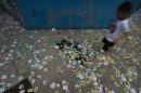 Electoral pamphlets of candidates litter the floor during municipal elections, in Sao Paulo, Brazil, on October 2, 2016