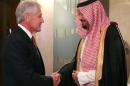 U.S. Secretary of Defense Chuck Hagel, left, greets Saudi Arabia Deputy Minister of Defense Prince Salman bin Sultan, before a meeting at the Radisson Hotel, on Friday, Dec. 6, 2013 in Manama, Bahrain. Secretary Hagel is visiting Bahrain while on a six day trip to the middle east, and is scheduled to speak at the Manama Dialogue Regional Security Summit tomorrow. (AP Photo/Mark Wilson, Pool)