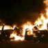 In this image taken from amateur video made available by Sham News Network in Syria  on Tuesday Dec. 13, 2011, show burning cars after being attacked by Assad supporters in Homs Syria, on Tuesday.(AP Photo/Sham News Network, via APTN) TV OUT