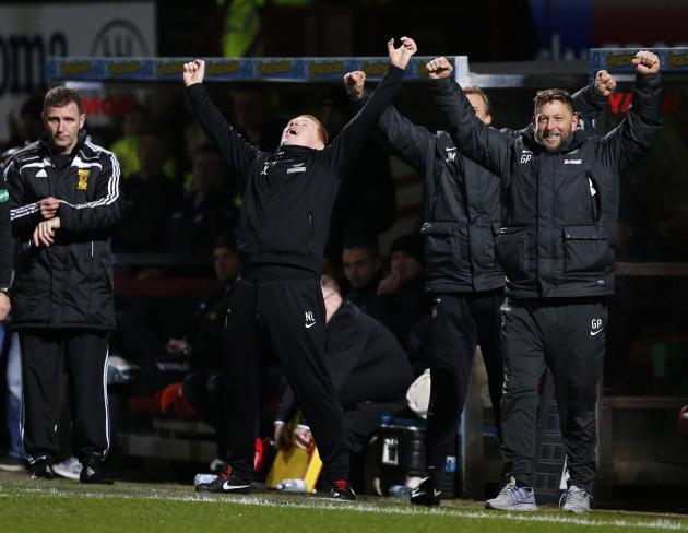 Celtic&#39;s manager Lennon celebrates as the fourth goal is scored against Partick Thistle during their Scottish Premier League soccer match at Firhill Stadium
