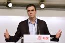 Spanish Socialist Party (PSOE) leader Pedro Sanchez gestures during a press conference at the PSOE headquarters in Madrid following his resignation as party head during an extraordinary meeting of the PSOE Federal Committee on October 1, 2016