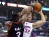 Los Angeles Clippers forward Blake Griffin, right, puts up a shot as Miami Heat guard Dwyane Wade defends during the first half of their NBA basketball game, Wednesday, Nov. 14, 2012, in Los Angeles. (AP Photo/Mark J. Terrill)