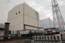The unit No.1 and No. 2 reactor building of the tsunami-crippled Fukushima Daiichi nuclear power plant are seen in Fukushima Prefecture