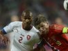 Theodor Gebre Selassie (left) vies with Russian forward Andrey Arshavin (right) during the match on June 8 in Wroclaw