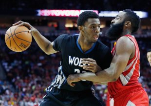 Last year's No. 1 pick, Andrew Wiggins, could share the floor with this year's top choice. (Scott Halleran/Getty)