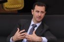 Syria's President Assad speaks during an interview with a Turkish newspaper in Damascus