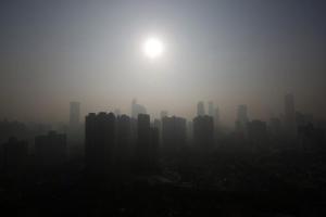 Buildings are seen through thick haze in downtown Shanghai