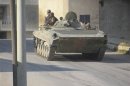 A tank belonging to forces loyal to Syria's President Bashar al-Assad is seen in Deraa