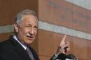 Attorney Mark Geragos comments on his client, California state Sen. Ron Calderon (D-Montebello), outside the Edward R. Royal Federal Court building, Monday, Feb. 24, 2014, in Los Angeles. Calderon pleaded not guilty Monday to federal charges that he accepted $100,000 in bribes in return for pushing legislation, charges that could send him to federal prison for years. (AP Photo/Damian Dovarganes)