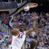 Arizona's Solomon Hill (44) dunks in front of Harvard's Laurent Rivard (0) in the first half during a third-round game in the NCAA men's college basketball tournament in Salt Lake City Saturday, March 23, 2013. (AP Photo/Rick Bowmer)