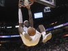 Miami Heat's LeBron James dunks against the Washington Wizards in their NBA basketball game in Miami