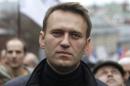Russian opposition leader Alexei Navalny walks during an opposition rally in Moscow
