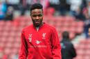 Liverpool's English midfielder Raheem Sterling warms up ahead of the English Premier League football match between Stoke City and Liverpool in Stoke-on-Trent, England on May 24, 2015