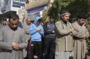 Sunni Muslims attend Friday prayers in the city of Falluja