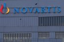 A logo is pictured on a building of Swiss drug maker Novartis before its annual general meeting in Pratteln