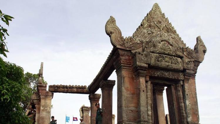 Cambodian police officials stand outside the Preah Vihear temple during a ceremony to withdraw from an area disputed with Thailand on July 18, 2012