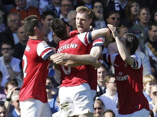 Arsenal wins to boost Champions League hopes